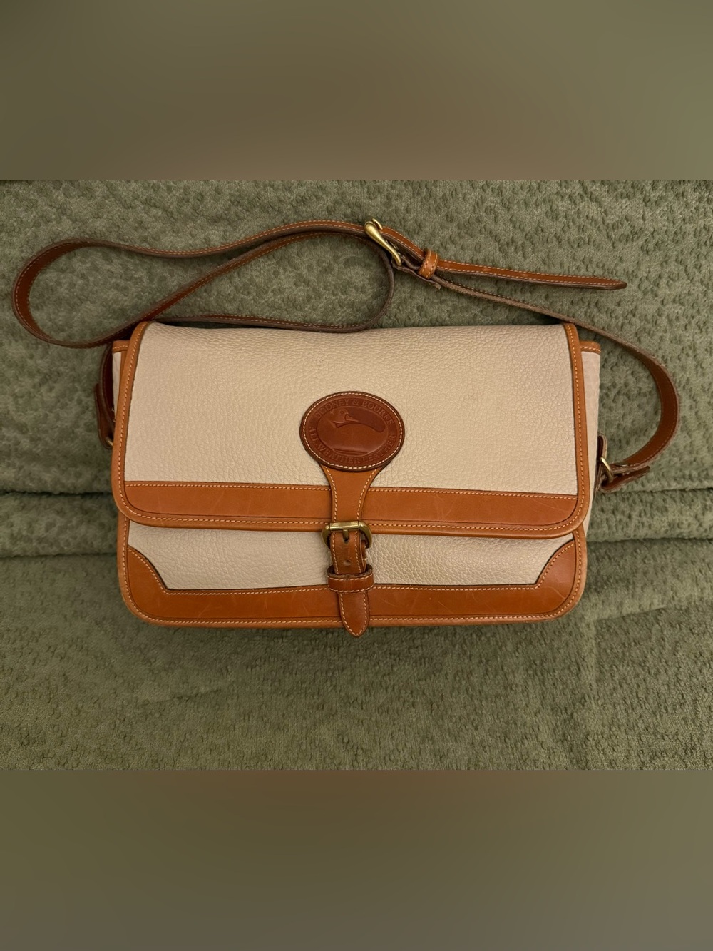 Vintage Dooney and Bourke all weather leather cream purse